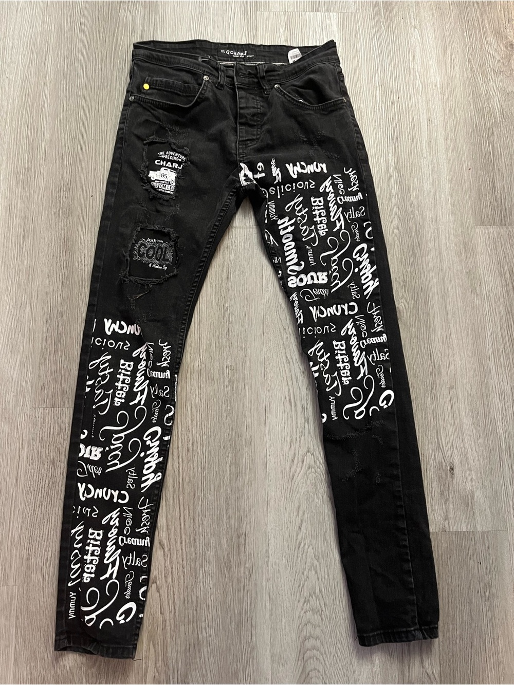 247–Black Skinny Men’s Jeans with White Graffiti Print